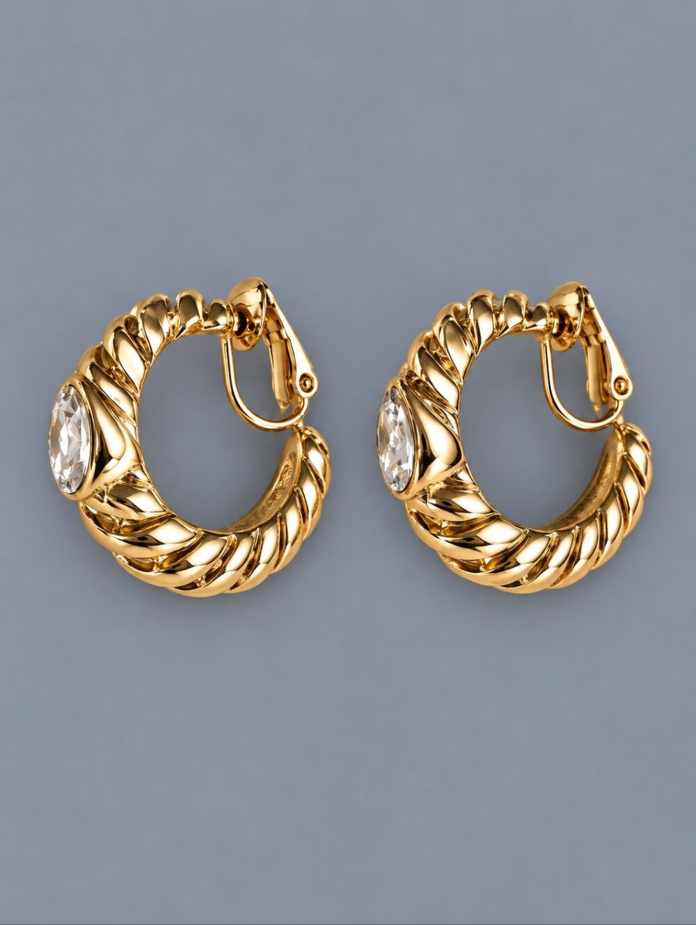 3/$25 Gold Twisted Hoop Clip-On Earrings with Clear Stone